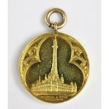 A late 19th century gold medallion commemorating the erection of Blackpool Tower in 1891,