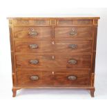 A Regency inlaid mahogany chest, with two frieze drawers above two short and three long drawers,