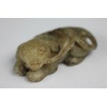 A Chinese carved jade figure of a Dog of Fo, 6.