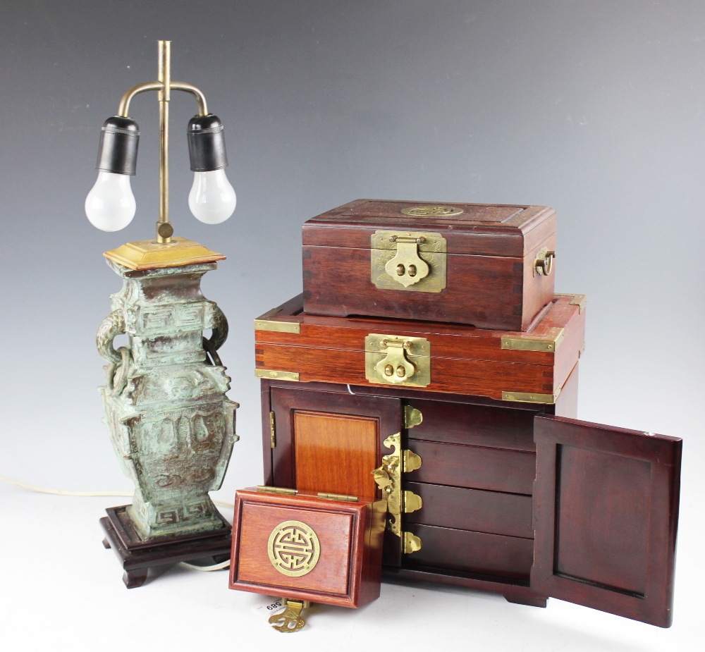A selection of oriental wares to include a Chinese archaic bronzed lamp base,
