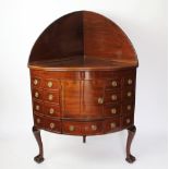 A George III style mahogany bow front corner cupboard, late 19th century,