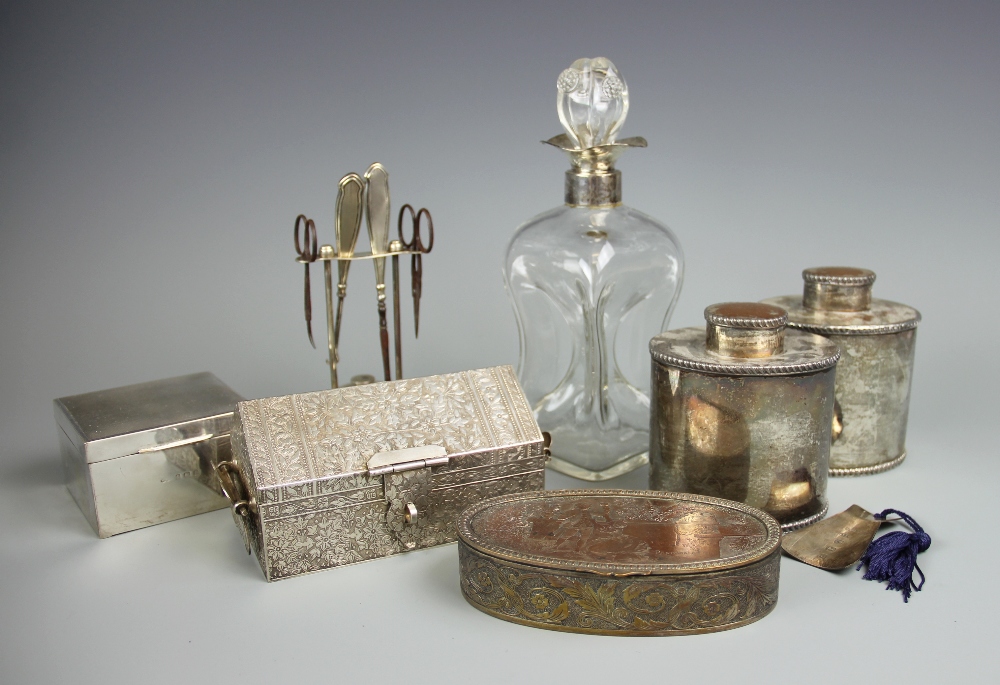 A selection of silver and white metal items to include;