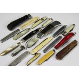 A selection of 19th century and later pocket and folding fruit knives,