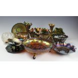 A selection of black and purple iridescent carnival glass ware including,