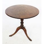 A George III oak occasional table, the single piece circular top with later carved detailing,