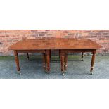 A large early 19th century and later mahogany extending dining table, with four spare leaves,