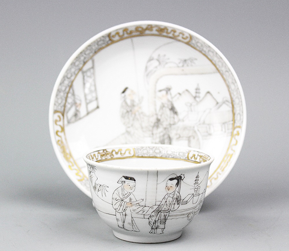 An 18th century style Chinese porcelain en grisaille cup and saucer, cup 4.