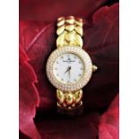 A Baume and Mercier 18ct gold and diamond set ladies wristwatch,