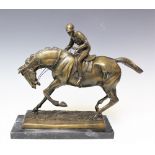 A contemporary bronze model of a horse and jockey, upon a marble plinth base,