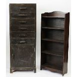 An early 20th century vintage stained pine pillar chest, with five drawers and a cupboard door,