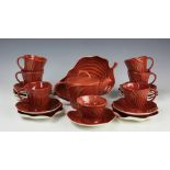 A Carlton Ware Pinstripe pattern leaf moulded tea service comprising; a teapot and cover,