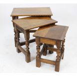 An early 20th century nest of three oak tables 45cm H x 50cm W x 44cm D