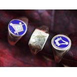 Two 9ct gold enamelled Masonic rings, each enamelled in blue and a further 9ct gold example,