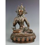 A Nepalese/Tibetan bronze sculpture of Vajarasattva, modelled seated with dorje and ghanta,