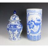 A modern Chinese blue and white stick stand, with a Chinese blue and white vase and cover,