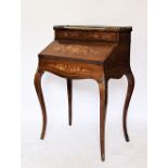 A late 19th century French inlaid rosewood bureau de dame, with two drawers,