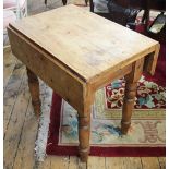 A Victorian rustic pine Pembroke table, on turned legs, 73cm H x 75cm W x 52cm D,