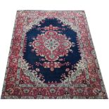 A Persian machine woven wool carpet,