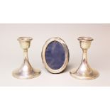 A pair of silver candlesticks, Levi & Salaman Birmingham 1922,