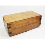 A large stained pine rustic blanket box, with hinged three panel top enclosing a vacant interior,