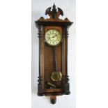 A walnut and beech Vienna regulator wall time piece, Arabic dial with subsidiary seconds,