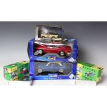 A selection of collectable model cars including a Corgi 57606 gold painted Range Rover,