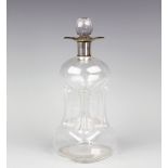 A silver collared glug decanter and stopper,