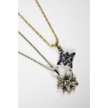 An amethyst set floral cluster pendant, set in yellow metal stamped '9k', and attached chain,