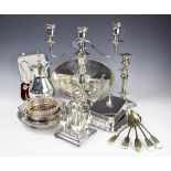 A selection of silver plated items to include a candelabrum, 39cm high, a four piece egg cruet,