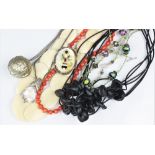 A collection of jewellery to include; bead necklaces, a coral coloured bead necklace,