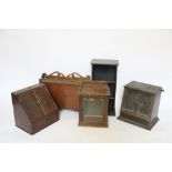 An Edwardian oak smokers cabinet, with glazed door, 36cm H,