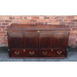 An 18th century oak mule chest, with hinge top and two drawers, lacking feet,