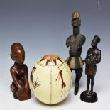An East African Kamba Kenya drumming figure, 18cm, with a Southern African Tsonga figure,