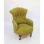 A Victorian salon chair, with button back green upholstery, on turned legs,