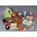 A collection of assorted collectable ceramics to include a Lorna Bailey model cat,