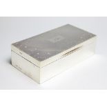 A silver cigarette box, 'D Bros' Birmingham 1936, the cover engraved 'Nan',