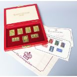 A cased set of seven silver gilt stamps, The Coronation Issue,