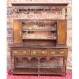 An 18th century style oak dresser,