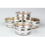 A pair of Roberts and Belk silver plated wine coasters, retailed by Mappin & Webb,