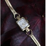 A ladys 'Wyler' wristwatch, the rectangular silvered dial with gilt Arabic numerals,