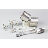 A selection of small silver to include; a pair of engine turned initialled napkin rings,