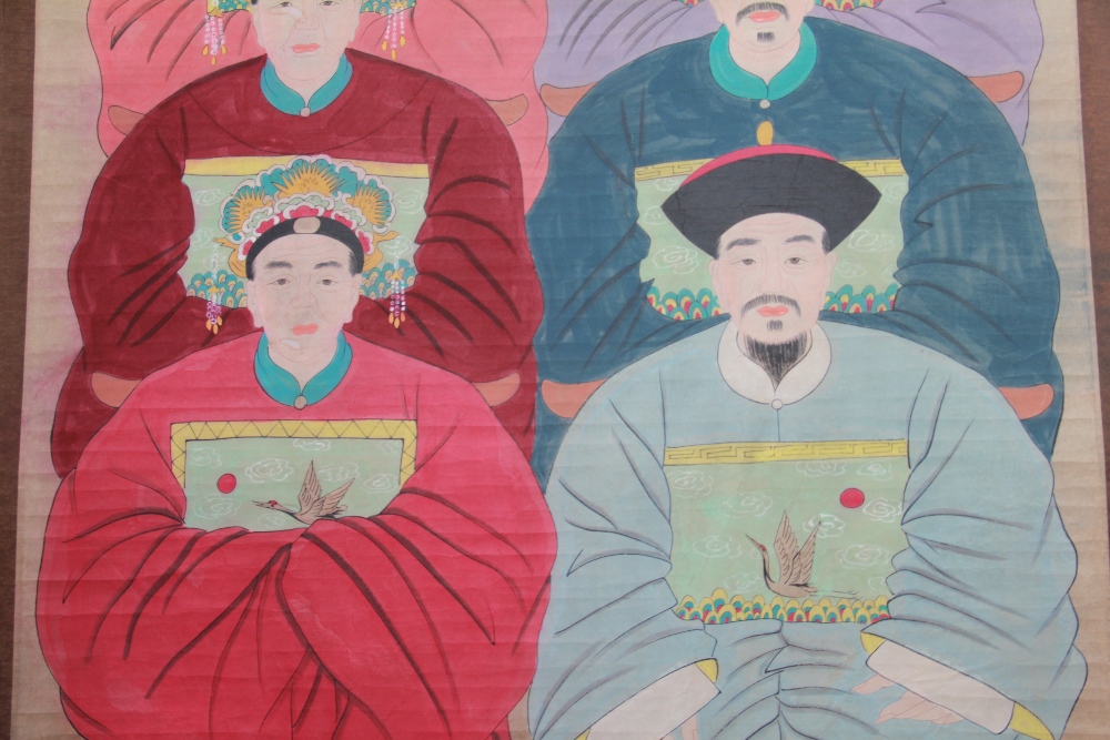 A 19th century Chinese large ancestral 1st rank scroll painting, depicting three males and females, - Image 3 of 3