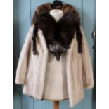 A collection of assorted fur coats, to include; a shearling coat with mink collar,