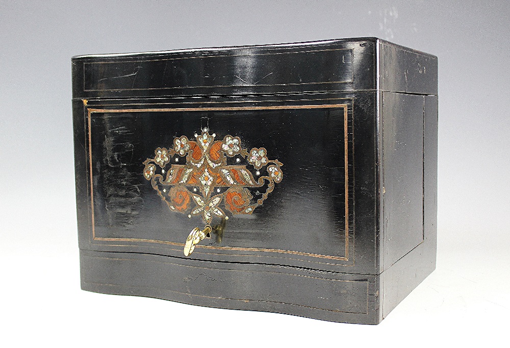 A 19th century ebonised liqueur cabinet, with brass, mother of pearl and king wood inlay,