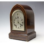 An Edwardian inlaid mahogany lancet shaped eight day clock,