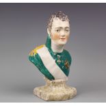 A 19th century Stafford pottery bust of Tsar Alexander I, upon marbled socle base,