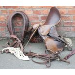 A selection of horse tack including and related items to include a silver mounted riding crop,