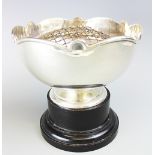 A George V silver rose bowl, London 1919, of plain polished design with moulded rim,