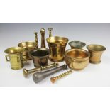 An assortment of late 17th century and later bronze mortars, comprising an ogee shaped heavy mortar,