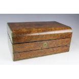 A Victorian burr walnut writing slope, the exterior with brass branding and engraved detailing,